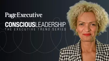 Individual smiling against a backdrop with 'Conscious Leadership' text.