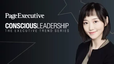 Person smiling in front of Conscious Leadership text and star graphics.