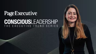 Page Executive Conscious Leadership banner featuring a smiling woman with long blonde hair, wearing a black outfit and a gold necklace, against a dark background with abstract wave patterns.