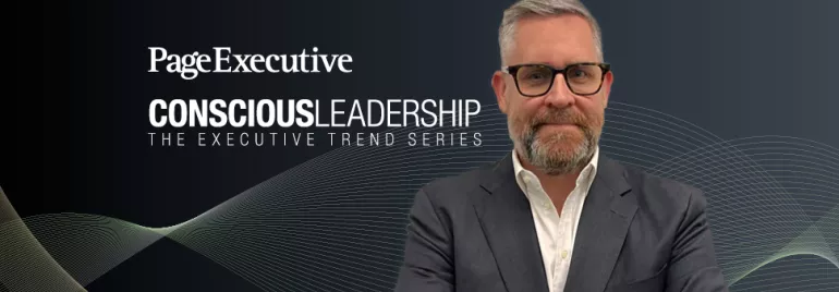 Man in a suit and glasses with 'Page Executive Conscious Leadership: The Executive Trend Series' text in the background.